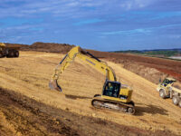 CLR-10 Clear and Grade Excavator and 2 Dump Trucks